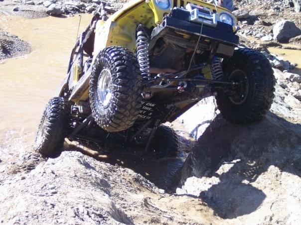 TJ in deep mud, axle showing